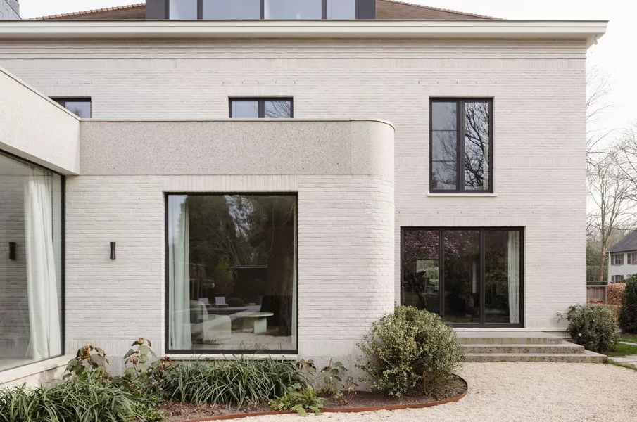Polished concrete facade panels by Faktordertig Architecten