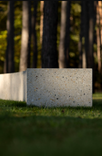 Memorial element among the trees